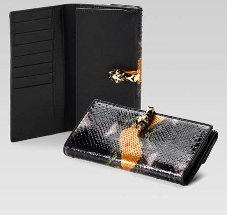 gucci continental wallet with tiger head detail|Gucci accessory collection wallet.